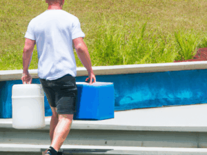DALL·E 2023-04-25 11.26.22 -   show man walking away to deliver pool chemicals to a pool.png